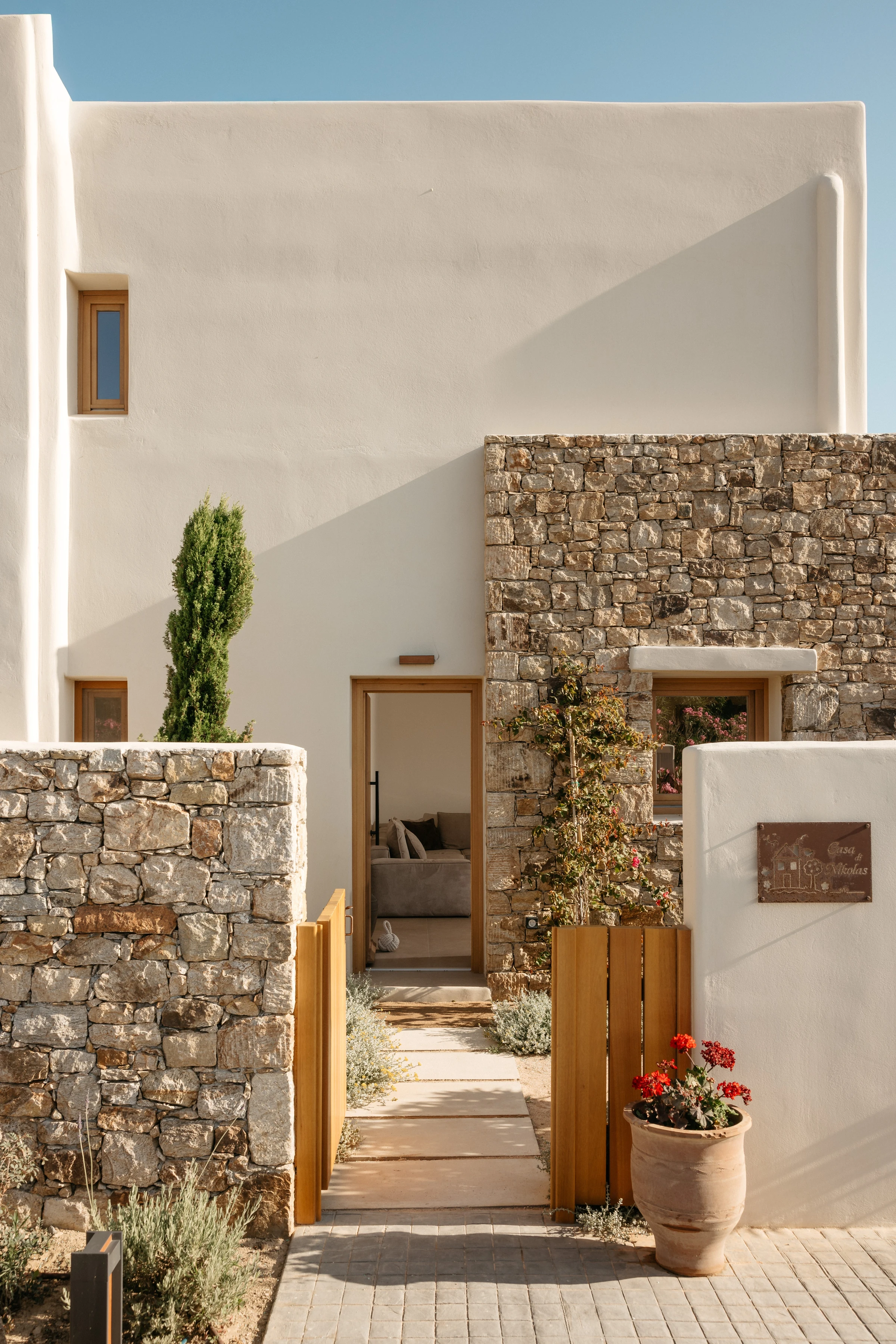 The timber gate and path to the front door
