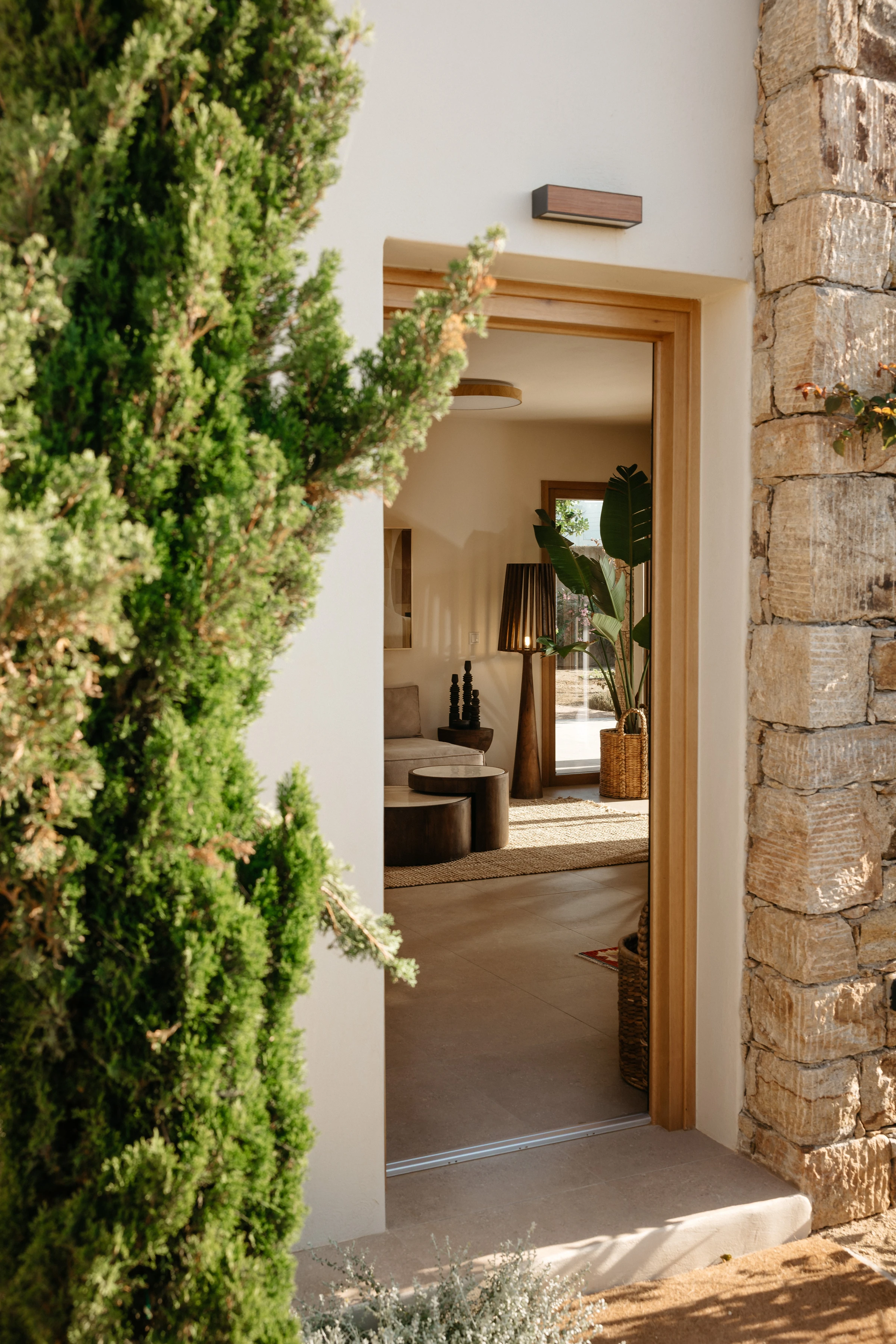 View through the timber doorway from the garden into the living room